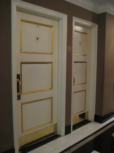 The Carlyle restroom doors, wide and narrow